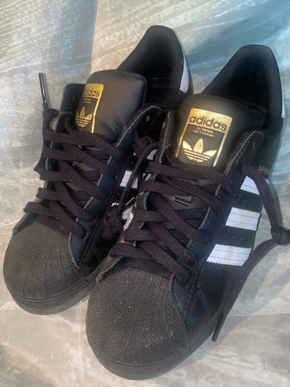 adidas Black & White Superstar Sneakers with Gold Tongue Badge